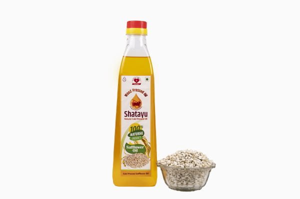 Safflower Oil extracted on Wooden Churner 100% Natural Without any preservatives